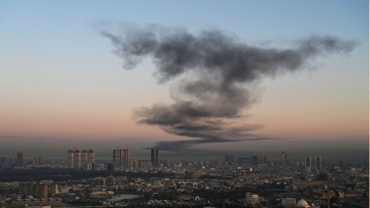 A plume of smoke rises near Erbil International Airport in Erbil on March 1, 2026. (AFP) A plume of smoke rises near Erbil International Airport in Erbil on March 1, 2026. (AFP)