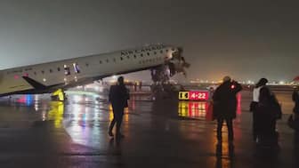 Unverified social media images showed an Air Canada aircraft with a badly damaged nose and cockpit. (@sentdefender/X)