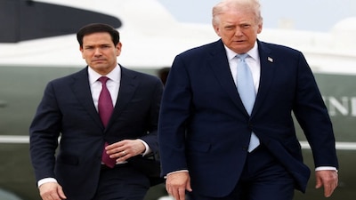 US President Donald Trump walks with Secretary of State Marco Rubio to board Air Force One as he departs from Joint Base Andrews in Maryland, US. Rubio will attend a G7 foreign ministers meeting near Versailles outside of Paris. Reuters
