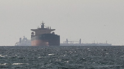 Tankers sail in the Gulf, near the Strait of Hormuz, as seen from northern Ras al-Khaimah, near the border with Oman’s Musandam governance. Before the war began, the Strait of Hormuz enabled the flow of about 20 per cent of global oil — roughly 15 million barrels of crude per day. File image/Reuters
