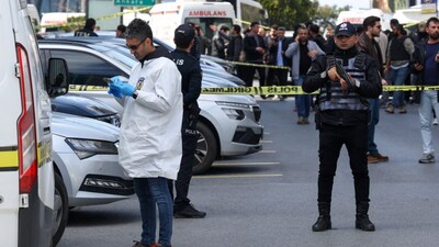 A forensic expert arrives at the scene after gunfire was heard near the building housing the Israeli consulate, according to a witness, in Istanbul, Turkey, on April 7, 2026. (Photo: Murad Sezer/Reuters) 