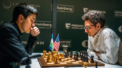 Uzbekistan's Javokhir Sindarov in action against Fabiano Caruana in the fourth round of the 2026 Fide Candidates tournament in Cyprus. Image credit: Yoav Nis/Fide