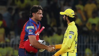 Ruturaj Gaikwad exchanges a handshake with Marcus Stoinis following Punjab Kings' five-wicket victory over Chennai Super Kings in Chennai. Reuters