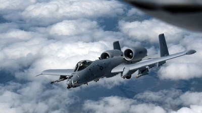 A US Air Force A-10 Thunderbolt II, also known as the Warthog, departs after receiving fuel in the skies near the border of Iowa and Missouri on July 7, 2020. (AFP)
