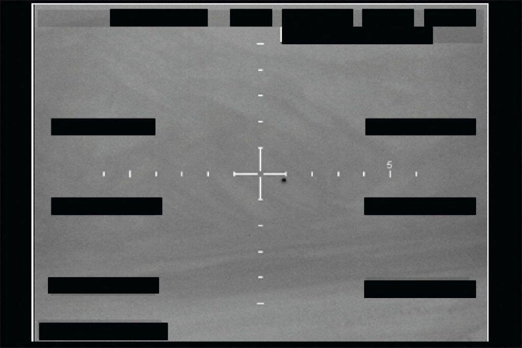An unidentified object (black dot) captured over the Western United States in December 2025 is seen in this infared still image as part of a series of documents of unidentified aerial phenomenon (UAP) released by the US Defense Department on May 8, 2026. Image/US Department of Defense