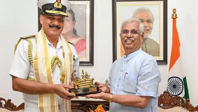 Kerala Governor Rajendra Vishwanath Arlekar with Navy chief Admiral Dinesh K Tripathi. PTI