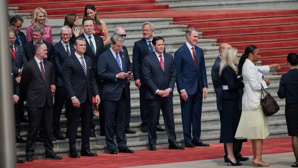 US Secretary of State Marco Rubio, US Treasury Secretary Scott Bessent, US Secretary of Defense Pete Hegseth, US Trade Representative Jamieson Greer, Jensen Huang, Founder, President and CEO of Nvidia, Elon Musk, Apple CEO Tim Cook and others stand together ahead of the arrival of US President Donald Trump for a welcome ceremony at the Great Hall of the People in Beijing, China, May 14, 2026. File Image/Reuters