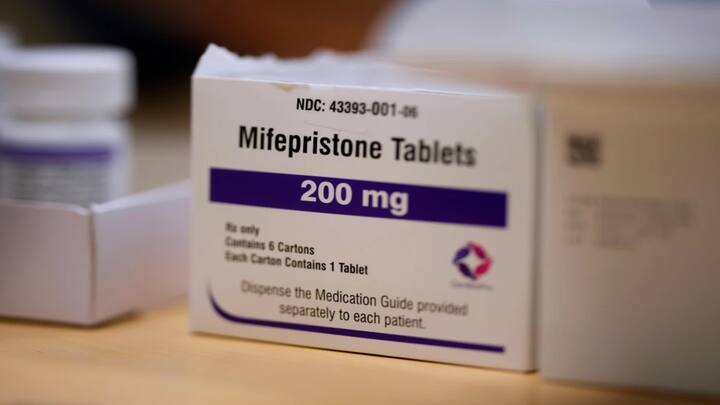 US appeals court temporarily halts mail delivery of abortion pills in latest crackdown on reproductive rights
