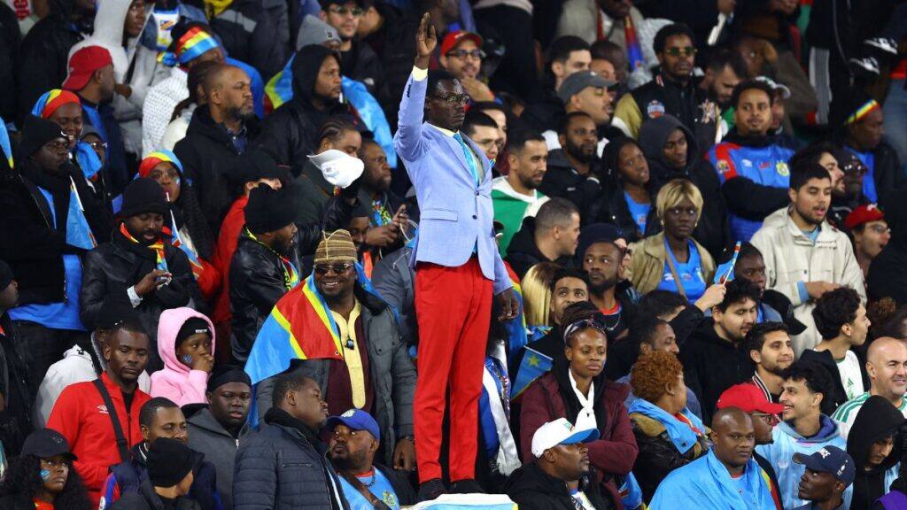Democratic Republic of Congo fan Michel Nkuka Mboladinga poses as a statue of the country's independence hero Patrice Lumumba during a CAF Africa Cup of Nations match in Moulay El Hassan Stadium, Rabat, Morocco, January 6, 2026. File Image/Reuters