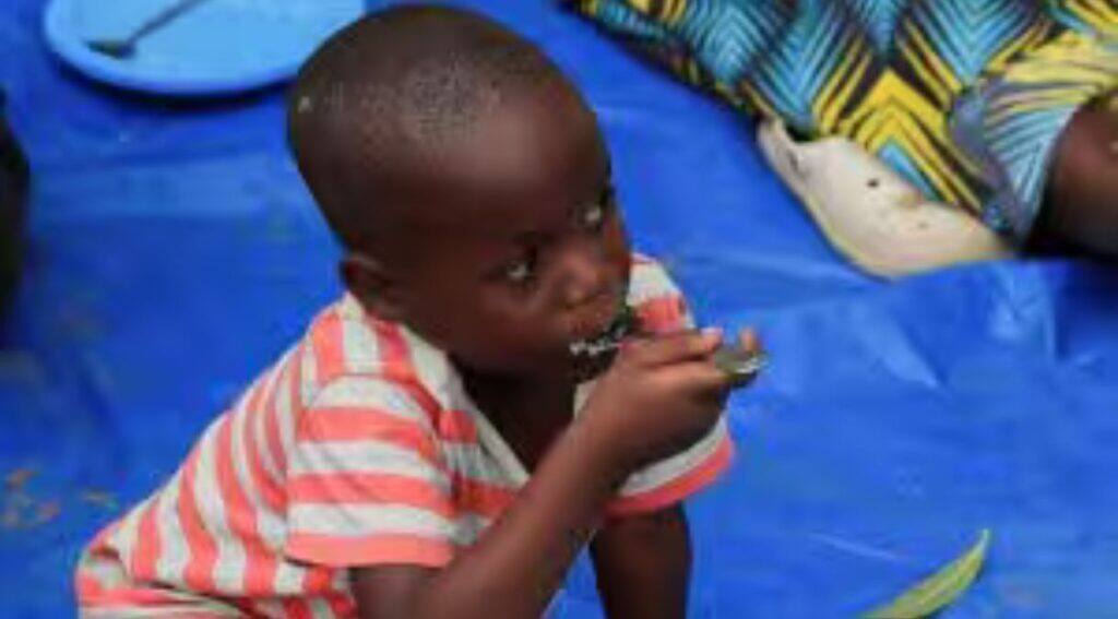A child eats traditional porridge at a rural home, as Zimbabwe is experiencing an El Nino-induced drought, resulting in malnutrition among children under the age of five, pregnant and lactating women, and adolescents, in Kotwa in Mudzi district, Zimbabwe July 2, 2024. REUTERS/Philimon Bulawayo