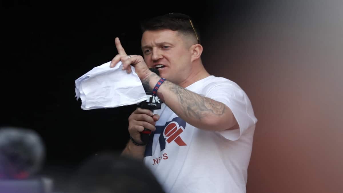 Far-right activist Tommy Robinson detained at Heathrow Airport under UK's counter-terror laws