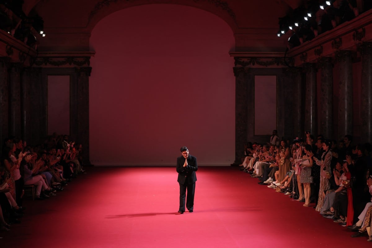 Indian fashion designer Manish Malhotra acknowledges the audience at the end of the Manish Malhotra Women Haute Couture Fall/Winter 2026-2027 collection as part of the Paris Fashion Week. AFP