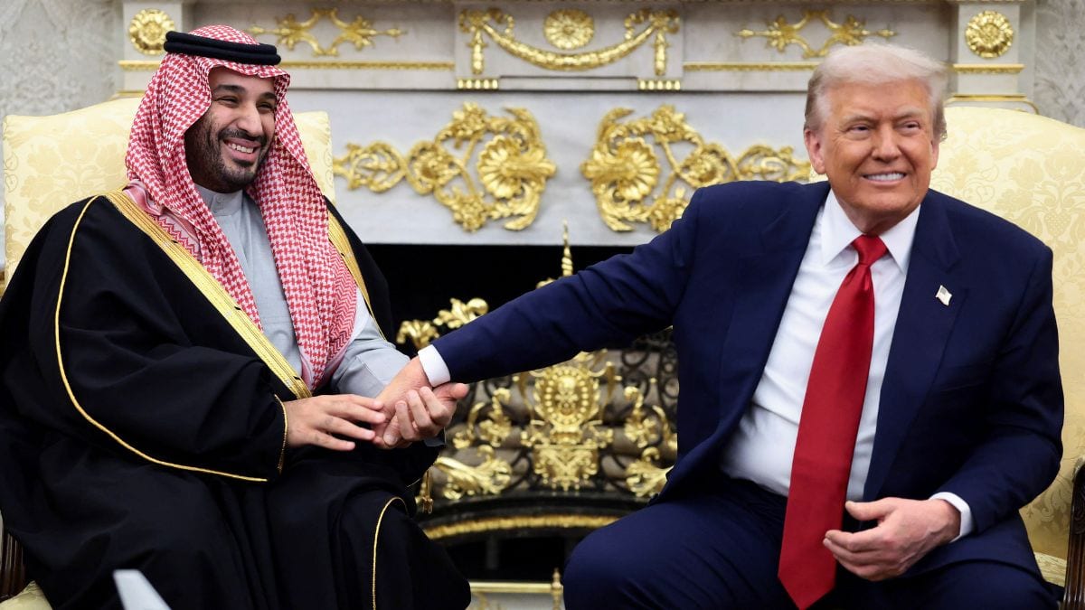 Saudi Crown Prince Mohammed bin Salman holds US President Donald Trump's hand during a meeting in the Oval Office at the White House in Washington, DC, on November 18, 2025. (Photo: Evelyn Hockstein/Reuters)