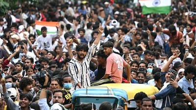Cockroach Janta Party (CJP) supporters celebrate the resignation of India's Education Minister Dharmendra Pradhan, at Jantar Mantar in New Delhi on July 25, 2026 amid the ongoing protests over alleged NEET exam irregularities.- AFP