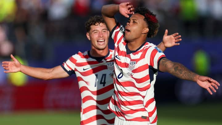 Ten-man USA beat Bosnia 2-0 to reach World Cup last 16, end 24-year knockout drought