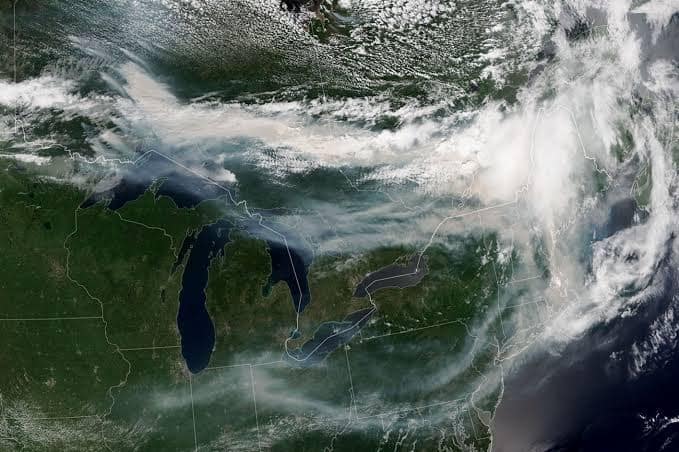 Satellite view of Canadian wildfire smoke blanketing eastern North America. Image/NASA Science