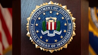 An FBI seal is displayed on a podium before a news conference at the field office in Portland. (AP)