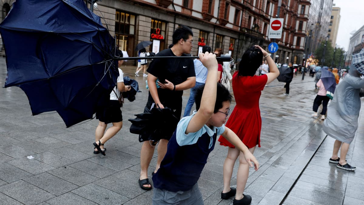 Typhoon Dolphin, strongest storm to hit China this year, weakens after landfall but continues to disrupt; Beijing floods as over a million evacuate