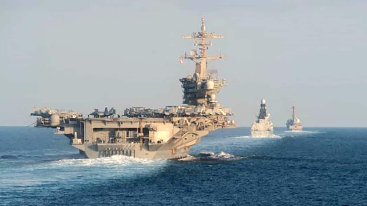 Are poor conditions on board Iran-deployed USS Abraham Lincoln forcing sailors to jump overboard?