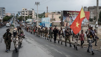 Tigray People's Liberation Front (TPLF) fighters walk in lines towards another field in Mekele, the capital of Tigray region, Ethiopia. Representative Photo: File/AFP