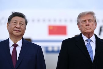 US President Donald Trump greets Chinese President Xi Jinping upon arrival at Joint Base Andrews in Maryland on September 23, 2026. Xi is visiting the United States from September 23 to 25. (Photo by Brendan SMIALOWSKI / AFP)