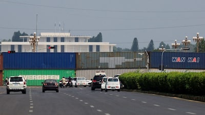 Shipping containers are used to block the road leading to the Aiwan-e-Sadr presidential palace ahead of a planned march by former Pakistani Prime Minister Imran Khan's PTI party in Islamabad, Pakistan, on September 24, 2026. (Photo: Akhtar Soomro/Reuters) 