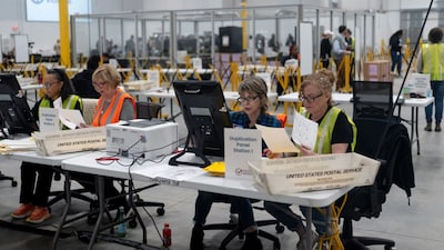 Fulton county workers process absentee ballots at Fulton County Operations Hub and Elections Center the day before the US presidential election in Atlanta, Georgia, USA, on November 4, 2024. (Photo: Cheney Orr/Reuters)