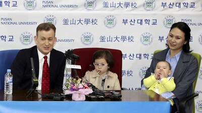 Prof. Robert Kelly, left, holds a press conference with his wife Jung-a Kim, right, and children James and Marion at the university in Busan, South Korea, Wednesday, March 15, 2017. (Photo: Ha Kyung-min/Newsis via AP) 