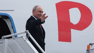 Russian President Vladimir Putin boards a plane as he departs from Delhi on September 13, 2026. (Photo: Alexander Kazakov/Sputnik/Pool via Reuters)
