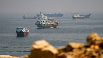 Vessels near the Strait of Hormuz, as seen from Musandam, Oman, August 31, 2026. File Image- Reuters