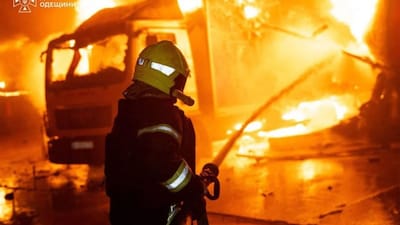 A firefighter extinguishing a fire in a production workshop, following a aerial attack in Odesa region, amid the Russian invasion of Ukraine, on September 27, 2026.- AFP