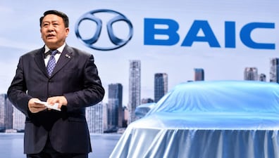Former BAIC Group chairman Xu Heyi attends an auto industry event.
