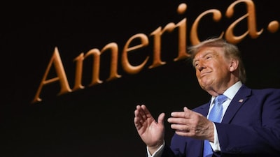 US President Donald Trump applauds during the America.gov launch event at Andrew W Mellon Auditorium in Washington, DC. The website features an artificial intelligence tool to help Americans interact with the federal government. AFP