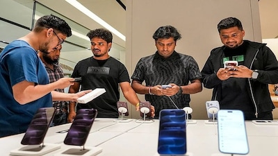 Customers check products at an Apple store during the official sales launch of the iPhone 18 Pro and iPhone 18 Pro Max, in Bengaluru, Karnataka. File image/PTI