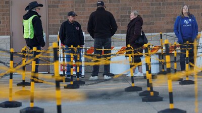 People line up to vote as early voting begins in Ohio, with former US Senator Sherrod Brown (D-OH) and Senator Jon Husted (R-OH) engaged in the second-most-expensive Senate race in the country, outside the Medina County Board of Elections in Medina, Ohio, US. Photo: Reuters