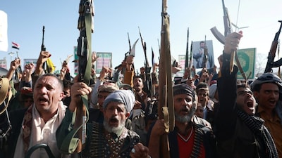 Houthi supporters rally to show support for the movement as fighting intensifies across several Yemeni fronts, in Sanaa, Yemen. Photo: File/Reuters