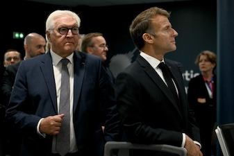 France's President Emmanuel Macron (R) and Germany's President Frank-Walter Steinmeier (L). (AFP)
