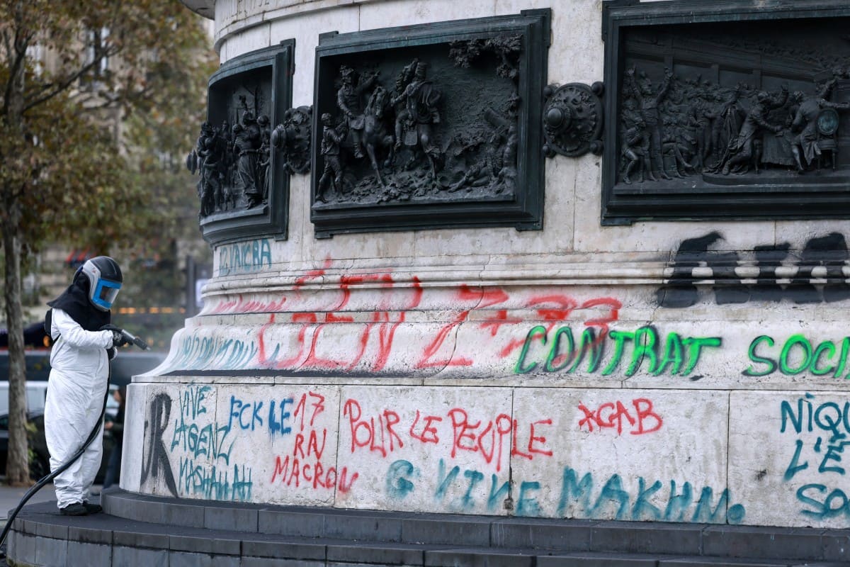 First Republic Square Paris scrubs riot graffiti off iconic Republic statue, but anger behind ...