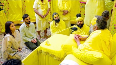 Virat Kohli's representatives have strongly denied allegations that the Indian cricket star was paid to visit Premanand Maharaj's ashram. Image: ANI