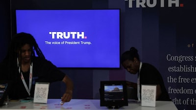 Workers straighten the Truth Social booth at the Great American State Fair celebrating the 250th anniversary of U.S. independence in Washington, D.C., U.S., July 2, 2026. Reuters