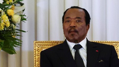 Cameroonian President Paul Biya listens as Pope Leo XIV (not pictured) delivers a speech, at the Presidential Palace in Yaounde, during his apostolic journey to Cameroon, April 15, 2026. Reuters