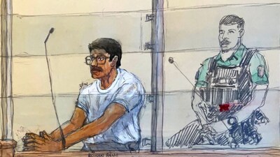 Indian national Rohan Rane (L) appears during his trial for having run a masculinist discussion group and allegedly forcing minors in which young girls, most of them minors, were forced to engage in sexual acts online and to mutilate themselves, at the assizes courthouse in Paris. AFP