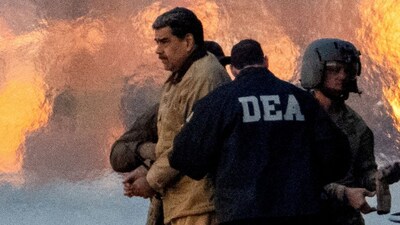 Captured Venezuelan President Nicolas Maduro is escorted, as he heads towards the Daniel Patrick Moynihan United States Courthouse in Manhattan for an initial appearance to face U.S. federal charges including narco-terrorism, conspiracy, drug trafficking, money laundering and others, at Downtown Manhattan Heliport, in New York City, U.S., January 5, 2026. File photo/Reuters
