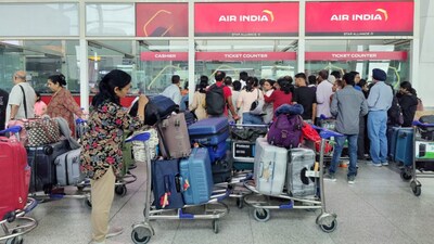 Passengers gather in front of the ticket counter of Air India at the Delhi airport as airlines as the flights got delayed and cancelled after airlines diverted flights following Israeli strikes in Iran. (Representational Image, Credit: Bhawika Chhabra/Reuters)