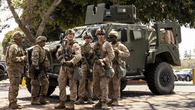 Members of the California National Guard and US Marines guard the entrance outside the Wilshire Federal Building ahead of nationwide 'No Kings Day' protest in Los Angeles, California, on June 13, 2025. (Photo: Stephen Lam/San Francisco Chronicle via AP)