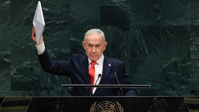 Israeli Prime Minister Benjamin Netanyahu holds up a Starlink device as he speaks during the 81st United Nations General Assembly at the United Nations Headquarters in New York on September 24, 2026. (Photo: Timothy A Clary/AFP)
