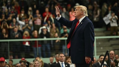 US President Donald Trump waves to the crowd as he walks off stage after speaking at a campaign rally at Curtis D Menard Memorial Sports Center in Wasilla, Alaska, on October 13, 2026. (Photo: Kent Nishimura/AFP)
