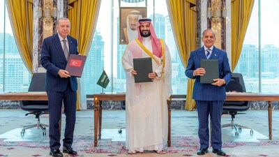 Turkish President Tayyip Erdogan, Saudi Crown Prince Mohammed bin Salman, and Pakistan's Prime Minister Shehbaz Sharif pose after signing the Mecca Agreement in Mecca, Saudi Arabia, on August 7, 2026. (Photo: Saudi Press Agency/Handout via Reuters)