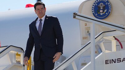 US Secretary of State Marco Rubio steps off a plane at Lisbon Airport, Portugal, on October 8, 2026. (Photo: Mark Schiefelbein/Pool via Reuters)
