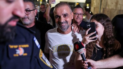 Yaniv Hayun, one of the men who helped incapacitate the attacker on the FlyDubai aircraft bound for Israel from the United Arab Emirates, which was diverted to Saudi Arabia following an emergency signal, reacts after arriving at the Ben Gurion International Airport, in Lod, near Tel Aviv, Israel, September 30, 2026. File Image/Reuters